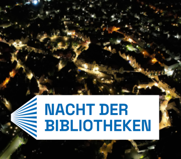 Bad Salzuflen beleuchtet am Abend mit Nacht der Bibliotheken-Logo, © Stadt Bad Salzuflen